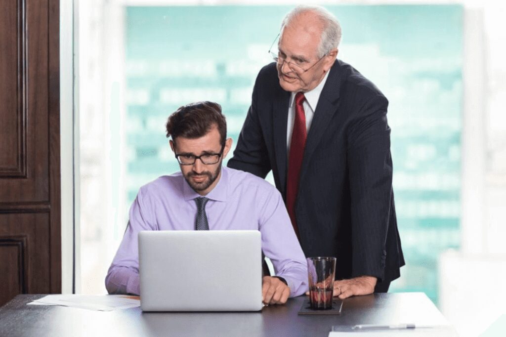 Business man helping employee to energize and motivate