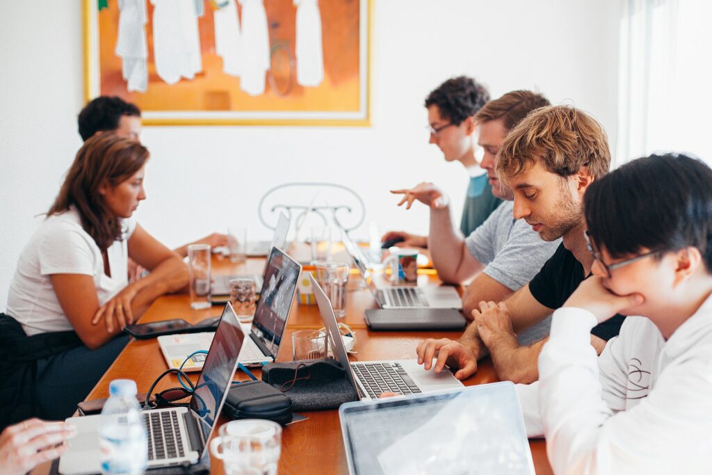 group of people working on computer