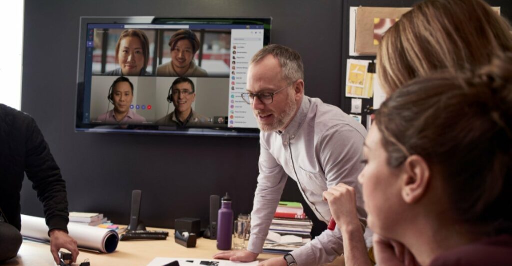 A group of people working together with virtual meeting and empowering businesses