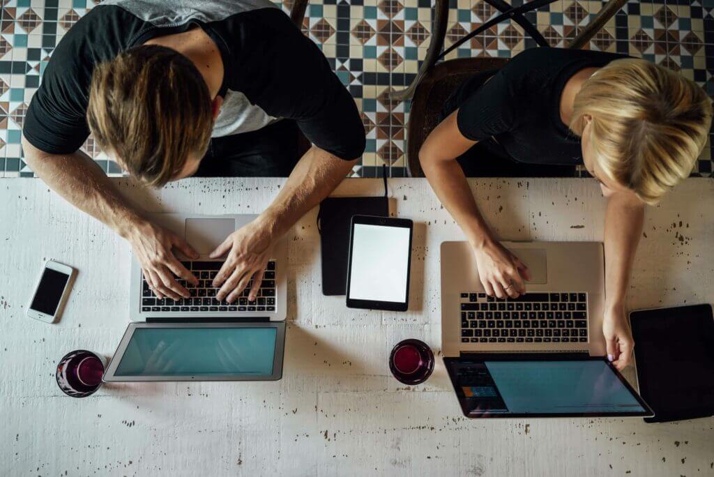 Male and Female  IT employees working on Automation 