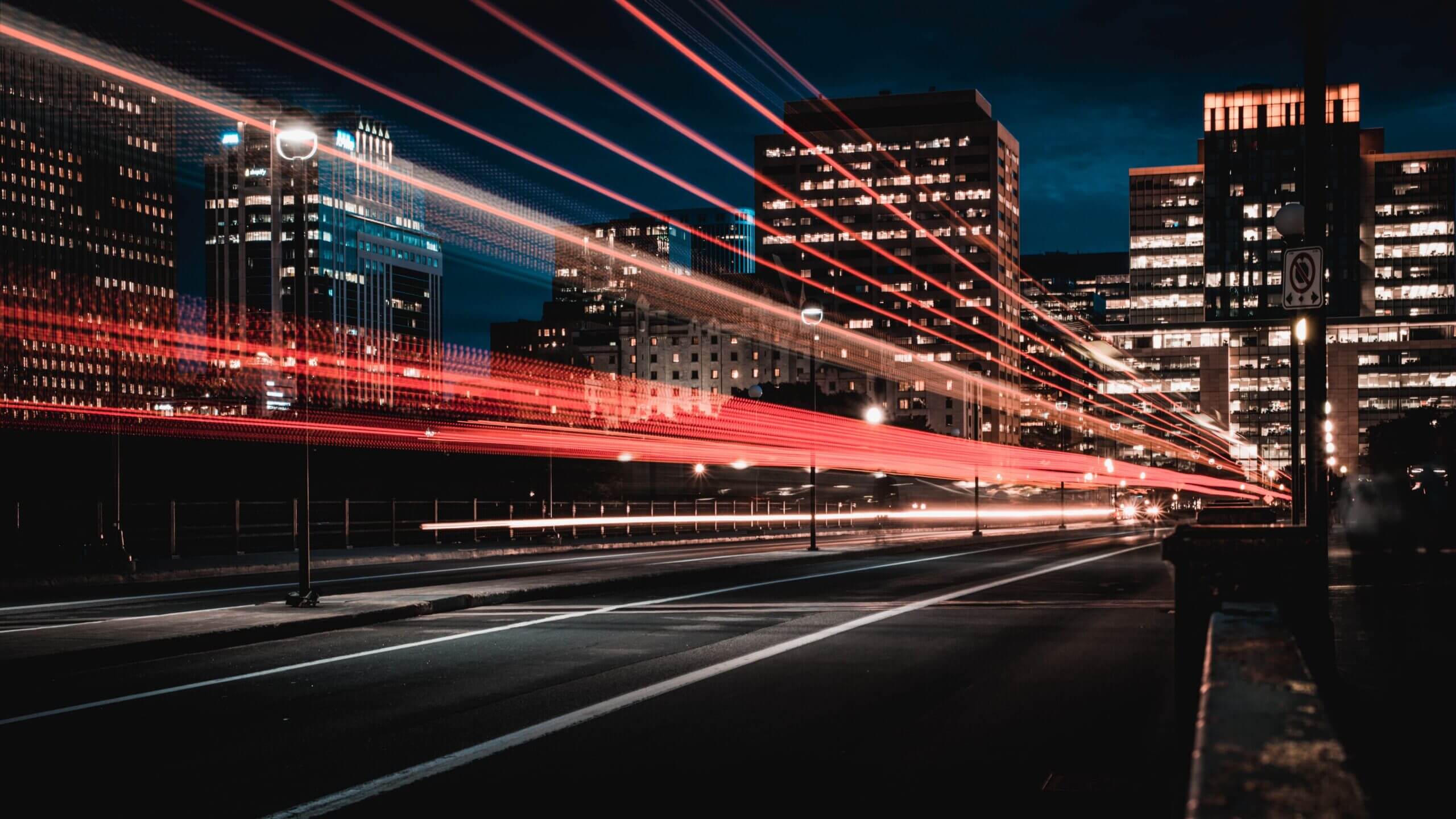 abstract image with road and buildings during night.