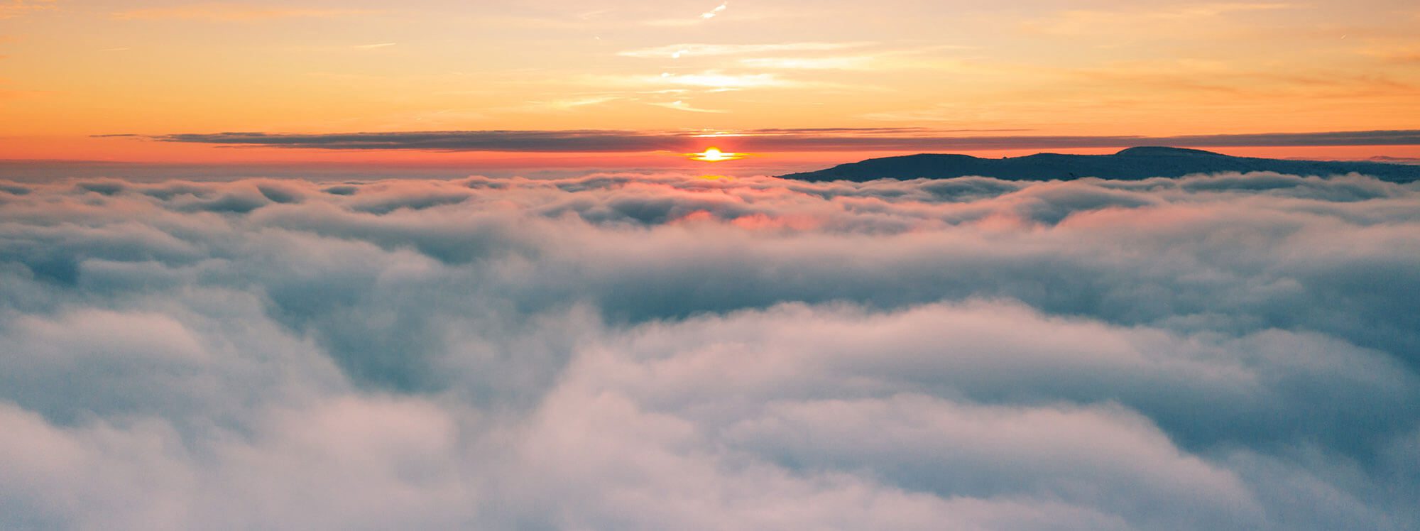 sky filled with clouds during sunset.