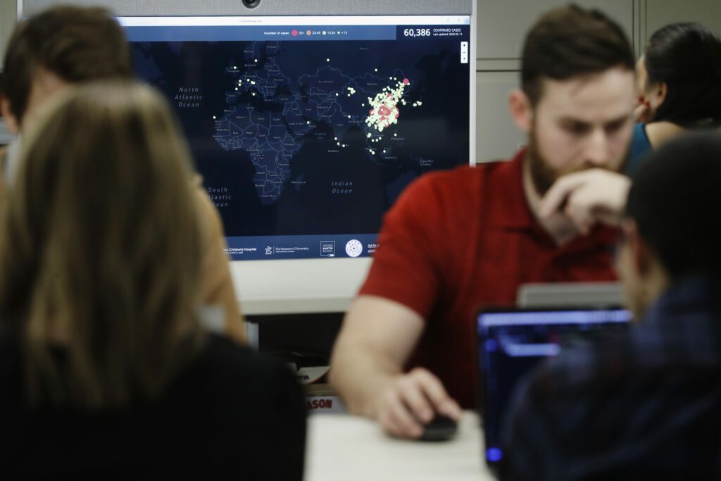 Group IT employees working on analysing Industry Trends in AI.