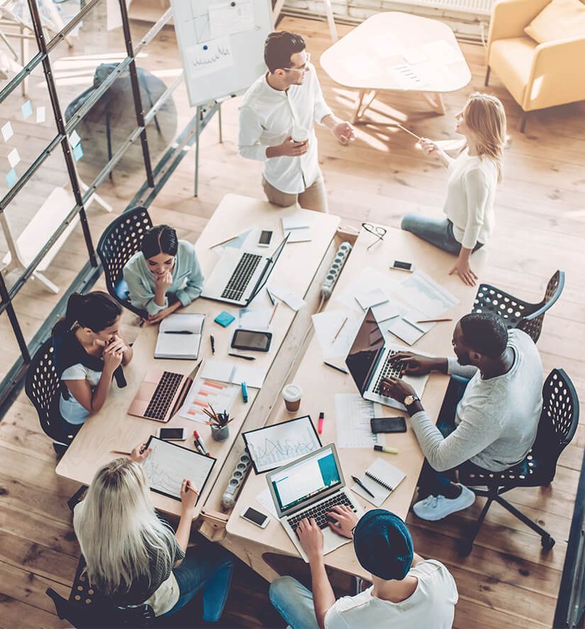 Top view of employees working in office
