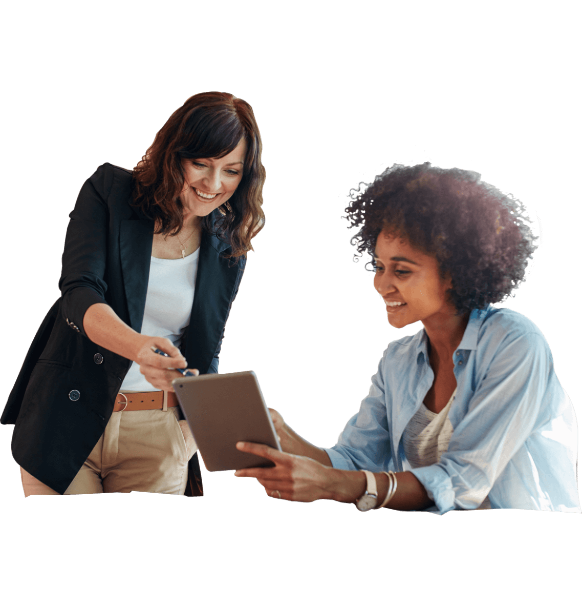 two women sharing ipad screen