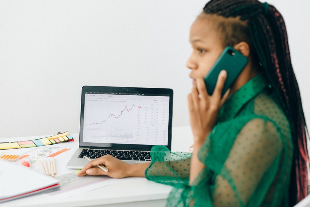woman talking on the cell phone about UX pain points