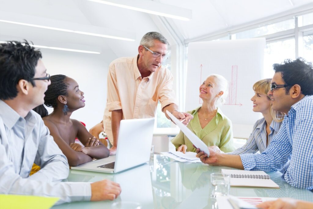 employees discussing web page design