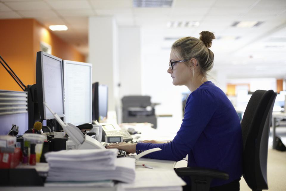 A woman working on the laptop