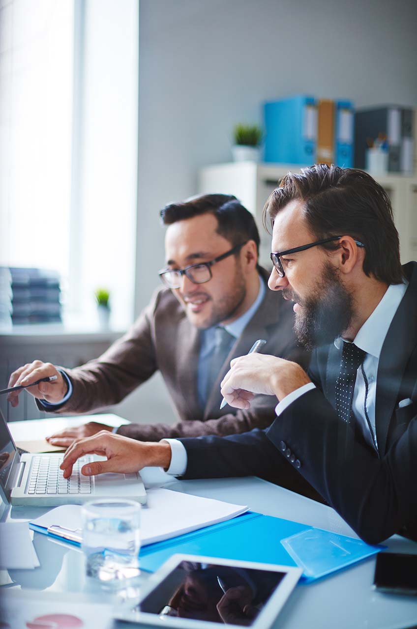 two men discussing insurance business technologies